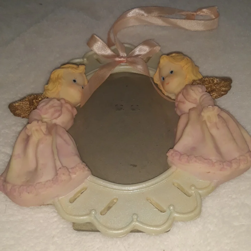 Angel photo frame with pink ribbon